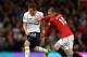 MANCHESTER, ENGLAND - SEPTEMBER 29: Gylfi Sigurdsson of Tottenham Hotspur and Wayne Rooney of Manchester United battle for the ball during the Barclays Premier League match between Manchester United and Tottenham Hotspur at Old Trafford on September 29, 2012 in Manchester, England. (Photo by Shaun Botterill/Getty Images)