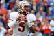 GAINESVILLE, FL - NOVEMBER 30: Jameis Winston #5 of the Florida State Seminoles attempts a pass during the game against the Florida Gators on November 30, 2013 in Gainesville, Florida. (Photo by Sam Greenwood/Getty Images)
