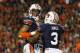 AUBURN, AL - NOVEMBER 30: Ryan Smith #24 of the Auburn Tigers yells to an official as he and Jonathan Jones #3 react after Smith recovered a blocked punt in the fourth quarter against the Alabama Crimson Tide at Jordan-Hare Stadium on November 30, 2013 in Auburn, Alabama. (Photo by Kevin C. Cox/Getty Images)