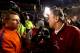 Clemson coach Dabo Swinney (left) congratulates South Carolina coach Steve Spurrier.