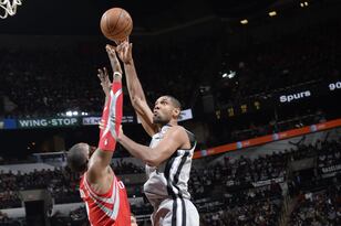 Hi-res-452675387-tim-duncan-of-the-san-antonio-spurs-shoots-against_crop_north