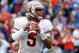 GAINESVILLE, FL - NOVEMBER 30: Jameis Winston #5 of the Florida State Seminoles attempts a pass during the game against the Florida Gators on November 30, 2013 in Gainesville, Florida. (Photo by Sam Greenwood/Getty Images)