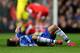 LONDON, ENGLAND - DECEMBER 01: Oscar of Chelsea is injured during the Barclays Premier League match between Chelsea and Southampton at Stamford Bridge on December 1, 2013 in London, England. (Photo by Ian Walton/Getty Images)