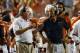 Sep 14, 2013; Austin, TX, USA; Texas Longhorns head coach Mack Brown (left) talks with defensive coordinator Greg Robinson (right) against the Mississippi Rebels during the second half at Darrell K Royal-Texas Memorial Stadium. Ole Miss beat Texas 44-23. Mandatory Credit: Brendan Maloney-USA TODAY Sports