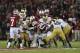 Nov 30, 2013; Stanford, CA, USA; Stanford Cardinal running back Tyler Gaffney (25) carries the ball against the Notre Dame Fighting Irish during the fourth quarter at Stanford Stadium. The Stanford Cardinal defeated the Notre Dame Fighting Irish 27-20. Mandatory Credit: Kelley L Cox-USA TODAY Sports