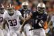 Nov 30, 2013; Auburn, AL, USA; Auburn Tigers quarterback Nick Marshall (14) runs against Alabama Crimson Tide linebacker Trey DePriest (33) during the fourth quarter at Jordan Hare Stadium. Mandatory Credit: John Reed-USA TODAY Sports