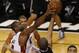 Jun 20, 2013; Miami, FL, USA; Miami Heat shooting guard Dwyane Wade (3) blocks the shot of San Antonio Spurs point guard Tony Parker (9) during the second quarter of game seven in the 2013 NBA Finals at American Airlines Arena. Mandatory Credit: Derick E. Hingle-USA TODAY Sports