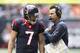 HOUSTON, TX - DECEMBER 01: Case Keenum #7 of the Houston Texans talks with coach Gary Kubiak during the game against the New England Patriots at Reliant Stadium on December 1, 2013 in Houston, Texas. (Photo by Bob Levey/Getty Images)
