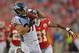 KANSAS CITY, MO - DECEMBER 01: Wide receiver Eric Decker #87 of the Denver Broncos catches a pass against defensive back Marcus Cooper #31 of the Kansas City Chiefs during the first half on December 1, 2013 at Arrowhead Stadium in Kansas City, Missouri. (Photo by Peter Aiken/Getty Images)