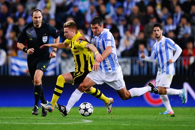 Hi-res-165360669-marco-reus-of-borussia-dortmund-duels-for-the-ball-with_crop_north