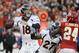Dec 1, 2013; Kansas City, MO, USA; Denver Broncos quarterback Peyton Manning (18) drops back to pass against the Kansas City Chiefs in the first half at Arrowhead Stadium. Mandatory Credit: John Rieger-USA TODAY Sports
