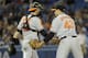 TORONTO, CANADA - SEPTEMBER 15: Matt Wieters #32 and Jim Johnson #43 of the Baltimore Orioles celebrate the teams win over the Toronto Blue Jays during MLB game action September 15, 2013 at Rogers Centre in Toronto, Ontario, Canada. (Photo by Brad White/Getty Images)