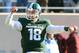 EAST LANSING, MI - NOVEMBER 30: Connor Cook #18 of the Michigan State Spartans celebrates a 15 yard touchdown run by Jeremy Langford #33 in the first quarter of the game against the Minnesota Golden Gophers at Spartan Stadium on November 30, 2013 in East Lansing, Michigan. The Spartans defeated the Golden Gophers 14-3. (Photo by Mark A. Cunningham/Getty Images)
