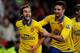 CARDIFF, WALES - NOVEMBER 30: Mathieu Flamini of Arsenal (L) celebrates with Olivier Giroud as he scores their second goal during the Barclays Premier League match between Cardiff City and Arsenal at Cardiff City Stadium on November 30, 2013 in Cardiff, Wales. (Photo by Mike Hewitt/Getty Images)