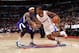 LOS ANGELES, CA - NOVEMBER 23: Chris Paul #3 of the Los Angeles Clippers dribbles against Isaiah Thomas #22 of the Sacramento Kings at Staples Center on November 23, 2013 in Los Angeles, California. NOTE TO USER: User expressly acknowledges and agrees that, by downloading and/or using this Photograph, user is consenting to the terms and conditions of the Getty Images License Agreement. Mandatory Copyright Notice: Copyright 2013 NBAE (Photo by Noah Graham/NBAE via Getty Images)