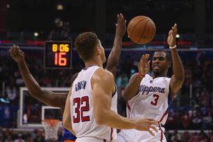 Hi-res-452329375-chris-paul-of-the-los-angeles-clippers-passes-the-ball_crop_north