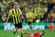 LONDON, ENGLAND - MAY 25: Marco Reus of Borussia Dortmund (L) in action with Philipp Lahm of Bayern Muenchen during the UEFA Champions League final match between Borussia Dortmund and FC Bayern Muenchen at Wembley Stadium on May 25, 2013 in London, United Kingdom. (Photo by Alex Livesey/Getty Images)