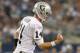 ARLINGTON, TX - NOVEMBER 28: Matt McGloin #14 of the Oakland Raiders celebrates a touchdown against the Dallas Cowboys at AT&T Stadium on November 28, 2013 in Arlington, Texas. (Photo by Ronald Martinez/Getty Images)