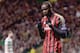 GLASGOW, SCOTLAND - NOVEMBER 26: Mario Balotelli of AC Milan celebrates after scoring during the UEFA Champions League Group H match between Celtic and AC Milan at Celtic Park Stadium on November 26, 2013 in Glasgow, Scotland. (Photo by Jeff J Mitchell/Getty Images)