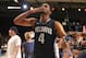 Nov 29, 2013; Paradise Island, BAHAMAS; Villanova Wildcats guard Darrun Hilliard (4) blows kisses to fans after the victory over the Kansas Jayhawks at the 2013 Battle 4 Atlantis in the Imperial Arena at the Atlantis Resort. Villanova won 63-59. Mandatory Credit: Kevin Jairaj-USA TODAY Sports