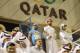 DOHA, QATAR - OCTOBER 23: Fans wearing traditional local dress attend the Gharafa vs. Kharaitiyat Qatar Stars League football match at Al Gharafa Stadium on October 23, 2011 in Doha, Qatar. Qatar will host the 2022 FIFA World Cup football competition and is slated to tackle a variety of infrastructure projects, including the construction of new stadiums. (Photo by Sean Gallup/Getty Images)