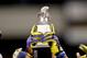 January 3, 2012; New Orleans, LA, USA; Michigan Wolverines players hold up the top of the Sugar Bowl trophy following an overtime win over the Virginia Tech Hokies in the Sugar Bowl at the Mercedes-Benz Superdome. Michigan defeated Virginia 23-20 in overtime. Mandatory Credit: Derick E. Hingle-USA TODAY Sports