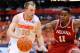 SYRACUSE, NY - DECEMBER 03: Trevor Cooney #10 of the Syracuse Orange drives to the basket against the defense of Yogi Ferrell #11 of the Indiana Hoosiers during the first half at the Carrier Dome on December 3, 2013 in Syracuse, New York. (Photo by Rich Barnes/Getty Images)