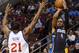 Dec 3, 2013; Philadelphia, PA, USA; Orlando Magic guard Arron Afflalo (4) shoots a jump shot over the defense of Philadelphia 76ers forward Thaddeus Young (21) during the first quarter at the Wells Fargo Center. Mandatory Credit: Howard Smith-USA TODAY Sports