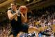 Mitch McGary grabs one of his 14 rebounds against Duke. Rebounding has not been a problem for the big man but scoring has early this season.