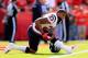 KANSAS CITY, MO - OCTOBER 20: Running back Arian Foster #23 of the Houston Texans stretches prio to the start of the game against the Kansas City Chiefs at Arrowhead Stadium on October 20, 2013 in Kansas City, Missouri. (Photo by Jamie Squire/Getty Images)