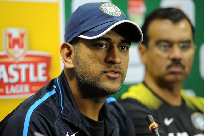 Hi-res-453056815-captain-dhoni-and-team-manager-chetan-desai-during-the_crop_north