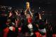 JOHANNESBURG, SOUTH AFRICA - JULY 11: Andres Iniesta of Spain holds the World Cup trophy aloft after the 2010 FIFA World Cup South Africa Final match between Netherlands and Spain at Soccer City Stadium on July 11, 2010 in Johannesburg, South Africa. (Photo by Clive Mason/Getty Images)