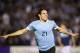MONTEVIDEO, URUGUAY - OCTOBER 15: Edinson Cavani (#21) of Uruguay celebrates a goal during a match between Uruguay and Argentina as part of the 18th round of the South American Qualifiers for the FIFA's World Cup Brazil 2014 at Centenario Stadium Stadium on October 15, 2013 in Montevideo, Uruguay. (Photo by Buda Mendes/Getty Images)
