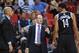Oct 25, 2013; Miami, FL, USA; Brooklyn Nets head coach Jason Kidd (left) listens as assistant coach Lawrence Frank (center) talks with point guard Shaun Livingston (right) during a timeout in a game against the Miami Heat at American Airlines Arena. Mandatory Credit: Steve Mitchell-USA TODAY Sports