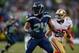 SEATTLE, WA - SEPTEMBER 15: Running back Marshawn Lynch #24 of the Seattle Seahawks runs a pass route against the San Francisco 49ers at CenturyLink Field on September 15, 2013 in Seattle, Washington. (Photo by Otto Greule Jr/Getty Images)