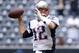 Dec 1, 2013; Houston, TX, USA; New England Patriots quarterback Tom Brady (12) warms up against the Houston Texans before the game at Reliant Stadium. Mandatory Credit: Thomas Campbell-USA TODAY Sports