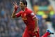 LIVERPOOL, ENGLAND - NOVEMBER 23: Luis Suarez of Liverpool celebrates scoring his team's second goal during the Barclays Premier League match between Everton and Liverpool at Goodison Park on November 23, 2013 in Liverpool, England. (Photo by Alex Livesey/Getty Images)
