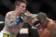 April 13, 2013; Las Vegas, NV, USA; Scott Jorgensen lands an elbow against Urijah Faber during the TUF 17 Finale at the Mandalay Bay Events Center. Mandatory Credit: Gary A. Vasquez-USA TODAY Sports