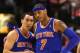 Feb 22, 2013; Toronto, ON, Canada; New York Knicks guard Pablo Prigioni (9) talks to forward Carmelo Anthony (7) against the Toronto Raptors at the Air Canada Centre. The Raptors beat the Knicks 100-98. Mandatory Credit: Tom Szczerbowski-USA TODAY Sports