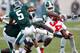 EAST LANSING, MI - SEPTEMBER 29: Carlos Hyde #34 of the Ohio State Buckeyes battles for yards during a fourth quarter run while playing the Michigan State Spartans at Spartan Stadium on September 29, 2012 in East Lansing, Michigan. Ohio State won the game 17-16. (Photo by Gregory Shamus/Getty Images)