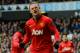 LONDON, ENGLAND - DECEMBER 01: Wayne Rooney of Manchester United celebrates scoring their second goal from the penalty spot during the Barclays Premier League Match between Tottenham Hotspur and Manchester United at White Hart Lane on December 1, 2013 in London, England. (Photo by Michael Regan/Getty Images)