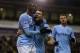WEST BROMWICH, ENGLAND - DECEMBER 04: Yaya Toure (L) of Manchester City celebrates with team mate James Milner after scoring his second goal during the Premier League match between West Bromwich Albion and Manchester City at The Hawthorns on December 4, 2013 in West Bromwich, England. (Photo by David Rogers/Getty Images)