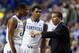 LEXINGTON, KY - NOVEMBER 25: John Calipari the head coach of the Kentucky Wildcats talks with Aaron Harrison #2 and Andrew Harrison #5 during the game against the Cleveland State Vikings at Rupp Arena on November 25, 2013 in Lexington, Kentucky. (Photo by Andy Lyons/Getty Images)
