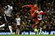 LIVERPOOL, ENGLAND - DECEMBER 4: Luis Suarez of Liverpool scores his first goal from a long range effort during the Barclays Premier League match between Liverpool and Norwich City at Anfield on December 4, 2013 in Liverpool, England. (Photo by Jan Kruger/Getty Images)