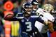 SEATTLE, WA - DECEMBER 02: Quarterback Russell Wilson #3 of the Seattle Seahawks looks to pass against the New Orleans Saints during a game at CenturyLink Field on December 2, 2013 in Seattle, Washington. (Photo by Otto Greule Jr/Getty Images)