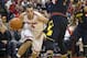Dec 4, 2013; Columbus, OH, USA; \o1\ drives underneath Maryland Terrapins forward Evan Smotrycz (1) at the Schottenstein Center. Mandatory Credit: Greg Bartram-USA TODAY Sports