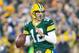 Nov 4, 2013; Green Bay, WI, USA; Green Bay Packers quarterback Aaron Rodgers (12) drops back to pass during the first quarter against the Chicago Bears at Lambeau Field. Mandatory Credit: Jeff Hanisch-USA TODAY Sports