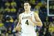 ANN ARBOR, MI - NOVEMBER 29: Mitch McGary #4 of the Michigan Wolverines runs down the court in his first home game of the season during the second half of the game against Coppin State Eagles at Crisler Center on November 29, 2013 in Ann Arbor, Michigan. Michigan Defeated Coppin State 87-45. (Photo by Leon Halip/Getty Images)