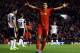 LIVERPOOL, ENGLAND - DECEMBER 4: Luis Suarez of Liverpool celebrates setting up the fifth goal for team mate Raheem Sterling during the Barclays Premier League match between Liverpool and Norwich City at Anfield on December 4, 2013 in Liverpool, England. (Photo by Jan Kruger/Getty Images)