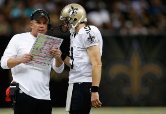 Hi-res-182567242-head-coach-sean-payton-talks-with-drew-brees-of-the-new_crop_north